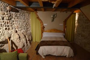 A bed or beds in a room at Casa LLovet