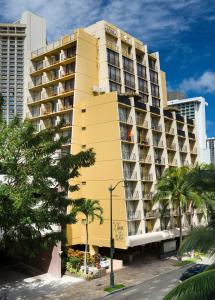 a large building with a large window on top of it at Castle Bamboo Waikiki Hotel in Honolulu