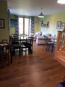 a living room with a table and chairs at Field View B&B in Eastrington