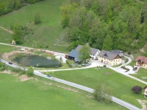 an aerial view of a house with a driveway at Gasthof Wölger in Admont