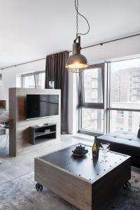 Posteľ alebo postele v izbe v ubytovaní Qbik Loft Aparts