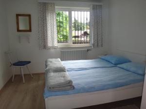 Ένα ή περισσότερα κρεβάτια σε δωμάτιο στο Ferienbungalow
