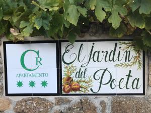 Ein Zertifikat, Auszeichnung, Logo oder anderes Dokument, das in der Unterkunft Apartamentos El Jardín del Poeta ausgestellt ist