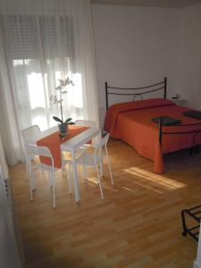 Posteľ alebo postele v izbe v ubytovaní Like Home Cisanello