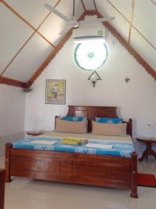 A bed or beds in a room at Suduweli Beauties of Nature - Yala