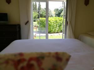 A bed or beds in a room at Arrábida Heritage @Portugal Luxury Retreat