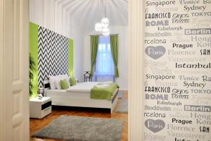 Posteľ alebo postele v izbe v ubytovaní Várkapitány Apartman Eger