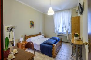 Posteľ alebo postele v izbe v ubytovaní Hotel Firenze 2000