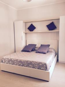 Postelja oz. postelje v sobi nastanitve Mini appartamenti a Catanzaro Lido
