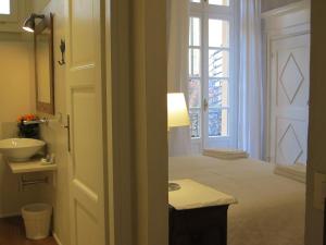A bed or beds in a room at Le Porte di Marzo
