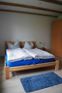 Postel nebo postele na pokoji v ubytování Ferienhaus Villa Apfelbaum