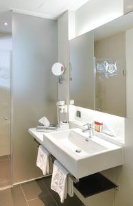 Kúpeľňa v ubytovaní Hotel Capricorno + 25 fotografií
