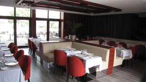 Restaurant o un lloc per menjar a Ile du Gua Suites