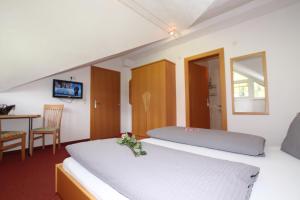 Giường trong phòng chung tại Apart Rustica