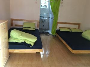Postel nebo postele na pokoji v ubytování Homestay Hoang Vy