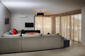 TV a/nebo společenská místnost v ubytování Appart'hotel Souani (Al Hoceima Bay) + 13 fotografií
