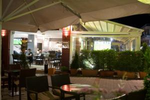 Restoran või mõni muu söögikoht majutusasutuses Hotel Cronos