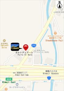 um mapa que mostra a localização de um parque de estacionamento em ホテル ポルト 男塾ホテルグループ em Himeji