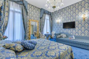 מיטה או מיטות בחדר ב-Residenza Veneziana
