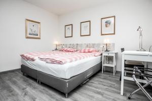 Rúm í herbergi á Hotel Dvur Hoffmeister