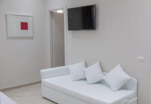 TV a/nebo společenská místnost v ubytování Venustas Roma Hotel + 37 fotografií