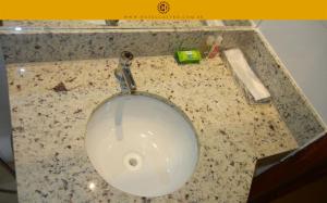 Um banheiro em Hotel Castro