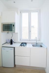 Kuchyňa alebo kuchynka v ubytovaní B & B REGINA MARGHERITA