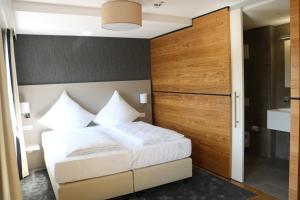 Postel nebo postele na pokoji v ubytování BA Hotel by WMM Hotels