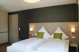 Postel nebo postele na pokoji v ubytování BA Hotel by WMM Hotels