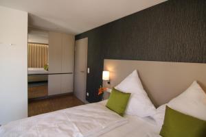 Postel nebo postele na pokoji v ubytování BA Hotel by WMM Hotels