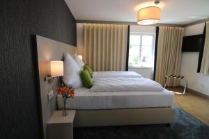 Postel nebo postele na pokoji v ubytování BA Hotel by WMM Hotels
