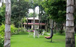 Κήπος έξω από το Hotel Parkland