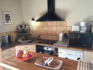 Køkken eller tekøkken på Coeur De Beaujolais