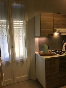 Kuchyň nebo kuchyňský kout v ubytování B&B Cristina e Stefano