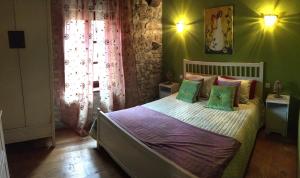 Postel nebo postele na pokoji v ubytování La Casona de Rudagüera