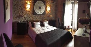 Postel nebo postele na pokoji v ubytování La Casona de Rudagüera