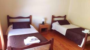 Postel nebo postele na pokoji v ubytování Hostal Sol de Atacama
