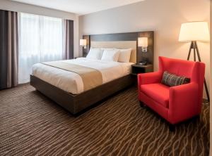 Postel nebo postele na pokoji v ubytování Country Inn & Suites by Radisson, Rochester-Pittsford-Brighton, NY