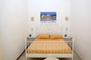 Cama o camas de una habitación en Appartamenti al Porto