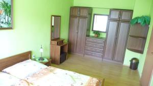 Postel nebo postele na pokoji v ubytování Hotel Štadión