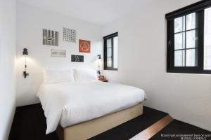 Voodi või voodid majutusasutuse ART'OTEL Ximending TAIPEI toas