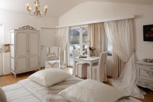 Postel nebo postele na pokoji v ubytování B&B Hof van Vervoering