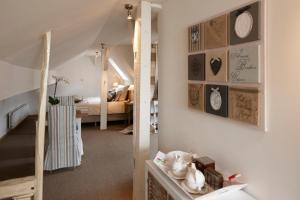 Postel nebo postele na pokoji v ubytování B&B Hof van Vervoering
