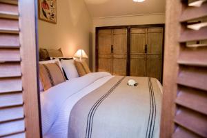 Ένα ή περισσότερα κρεβάτια σε δωμάτιο στο Olive Hill Guest Lodge