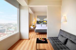 Posezení v ubytování KIMAYA Braga Bandung by HARRIS + 36 fotografií