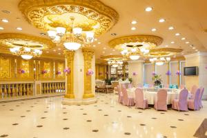 En restaurang eller annat matställe på Nan Yang Royal Hotel