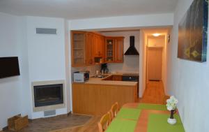 Kuchyň nebo kuchyňský kout v ubytování Apartmán Pohoda Nová Pec
