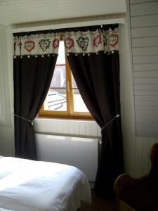 Postel nebo postele na pokoji v ubytování Hotel de la Lande