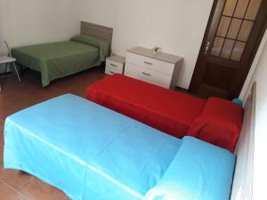Postel nebo postele na pokoji v ubytování appartamento trieste