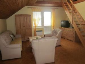 TV a/nebo společenská místnost v ubytování Apartman Aneta